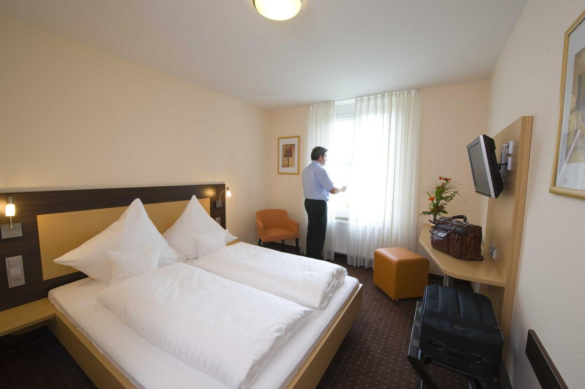 Hotel Berkheimer Hof Эсслинген Номер фото